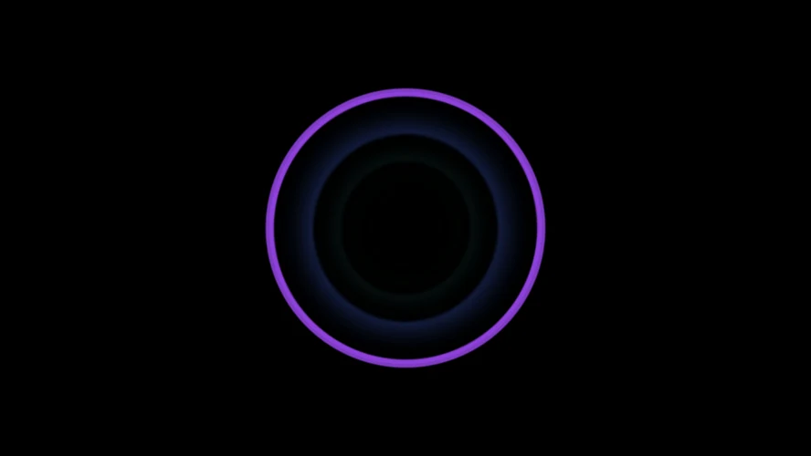 A violet ring on black with fainter blue rings trailing inside it.